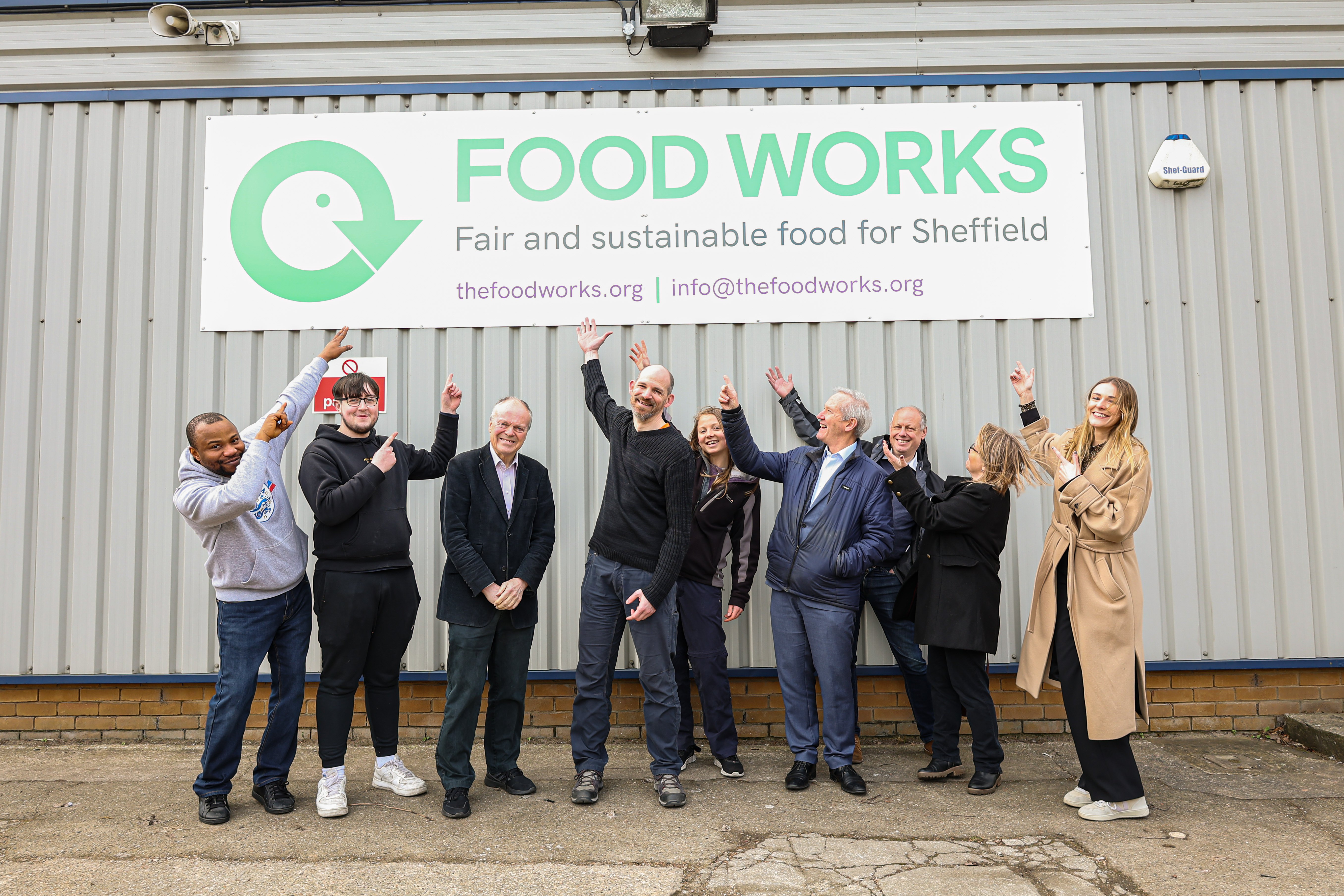 Clive Betts MP (second from left) and Food Works CEO Rene Meijer (third from left) join staff from Food Works, Big Society Capital and Key Fund outside Food Works’ Handsworth ‘market’ – where food is delivered and stored